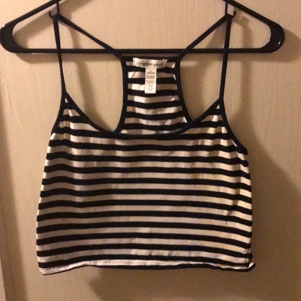 A large woman’s striped crop top